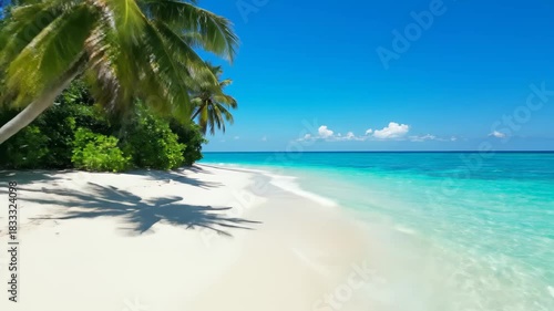 Wallpaper Mural Experience the beauty of a secluded tropical island paradise with swaying palm trees and crystal clear turquoise waters lapping at the shore Torontodigital.ca