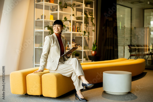 Professional woman sitting ...