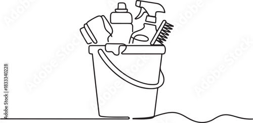 Bucket with cleaning supplies in one continuous line drawing. Cleanup and washing concept in simple linear style. Household and housekeeping symbol in editable stroke. one line Icon drawing