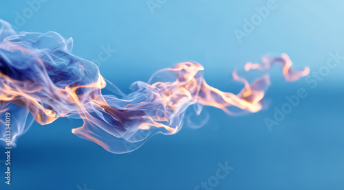 Blue sky with a long, wavy flame of fire. The flame is blue and yellow, and it is moving through the air