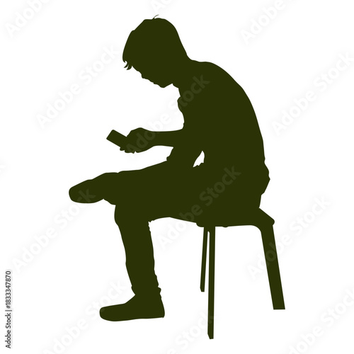 Boy checking mobile silhouette