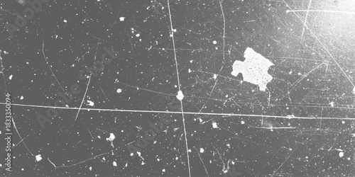 Gritty distressed gray surface with white scratches and scattered dust texture