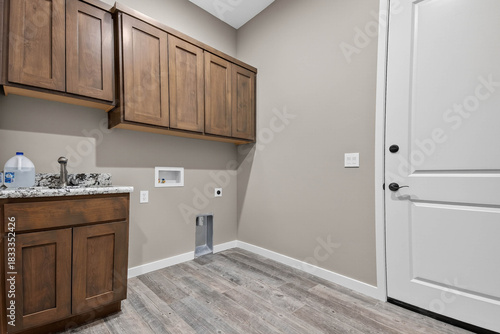 Photography Efficient Laundry Space With Storage Options, Cleverly Designed Utility Room Sui
