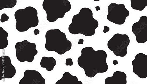 Seamless pattern of black and white cow spots for a playful and rustic farm animal textile design