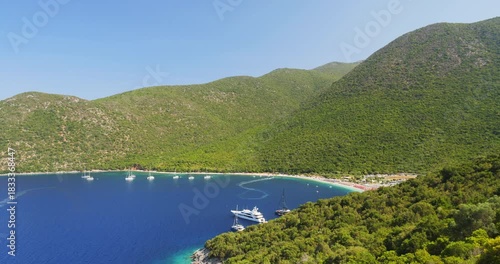 Antisamos beach in Greek island of Kefalonia, one of the most beautiful and famos Blue Flag beach, with blue waters surrounded by green mountains