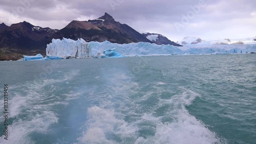 Perito Moreno Glacier in Patagonia showing massive ice wall, turquoise water, frozen textures, rugged wilderness, dramatic landscape, natural environment, climate scenery majestic travel area backdrop