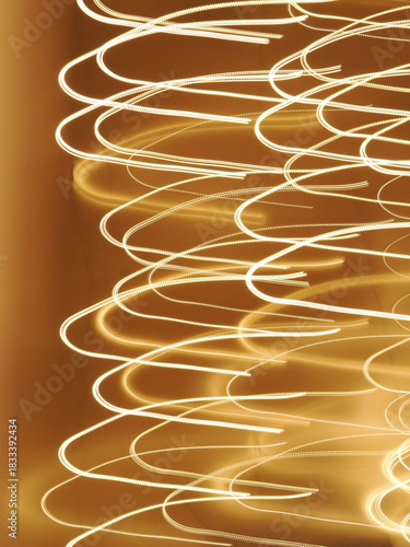 golden light streaks abstract background swirls