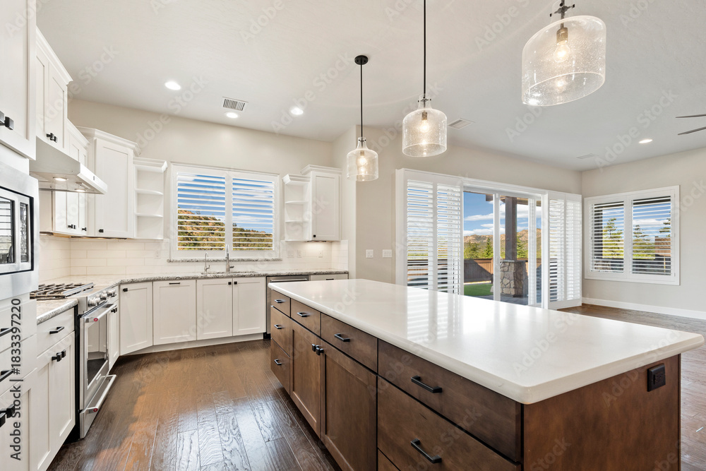 Fototapeta premium Elegant Kitchen With Bright Lighting, Modern Culinary Space With Impressive Lighting And Outdoor Views