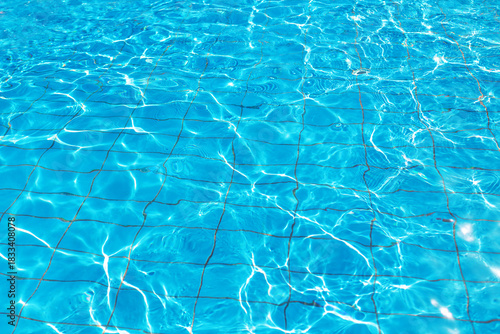 Bright blue swimming pool water texture