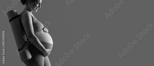 Sporty young pregnant woman...