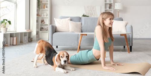 Sporty young woman with Bea...
