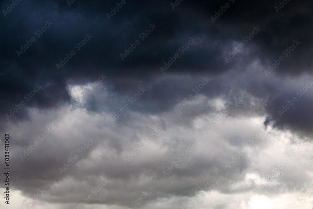Fototapeta premium Dramatic dark storm clouds in the sky