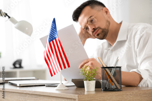 Handsome young tired man wi...