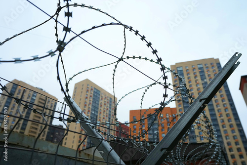 New buildings behind barbed wire. A no-go zone for young families.