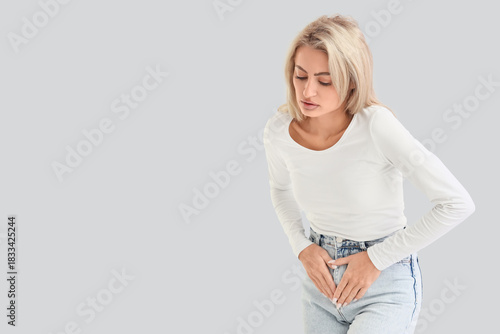 Young woman suffering from ...