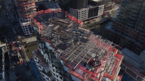 aerial pullback shot of tower under construction in Gowanus Brooklyn