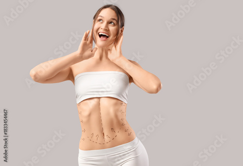 Happy young woman in underw...