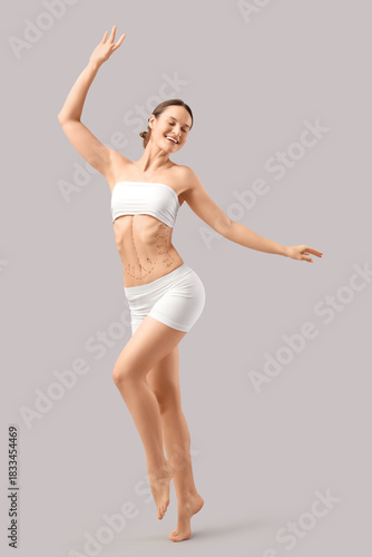 Young woman in underwear wi...