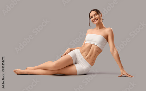 Young woman in underwear wi...