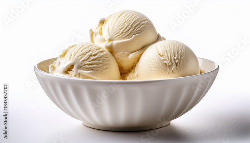 creamy vanilla ice cream scoops in white bowl on white background