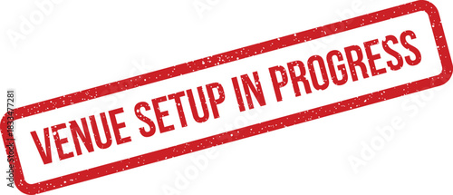 Distressed rubber stamp illustration with bold uppercase text VENUE SETUP IN PROGRESS, signifying ongoing event preparation activity
