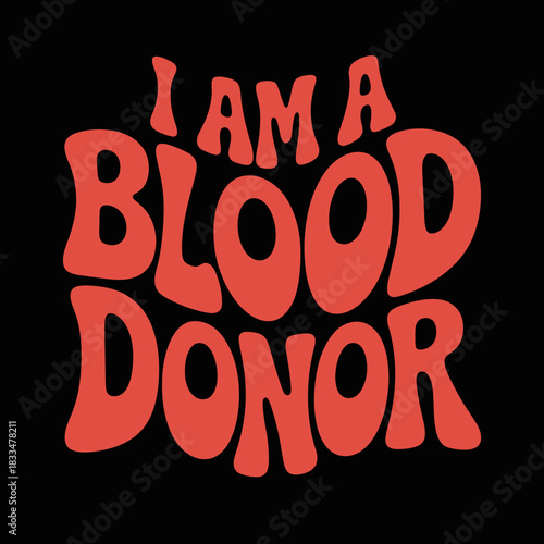 The image features bold red text on a black background stating 'I Am a Blood Donor'. The font is stylized and eye-catching.