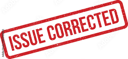 Grungy red rubber stamp displaying the bold text ISSUE CORRECTED signifying a successful fix