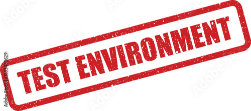Grungy red rubber stamp with TEST ENVIRONMENT text, indicating a dedicated setting for development or software testing