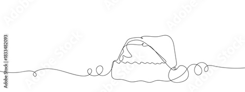 Santa Claus's hat is placed on the table in one continuous line. single line art style vector illustration. Editable stroke.