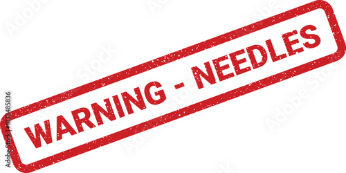 Textured rectangular label with bold uppercase WARNING NEEDLES text, indicating a biohazard or sharp object risk