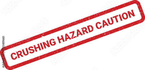 A bold red rectangular grunge stamp displaying the safety message CRUSHING HAZARD CAUTION diagonally across its surface