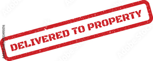 Distressed delivered to property text inside rectangular stamp mark for real estate logistics