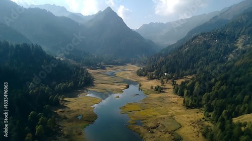 Scenic Mountain Valley with River and Forest Under Bright Sky