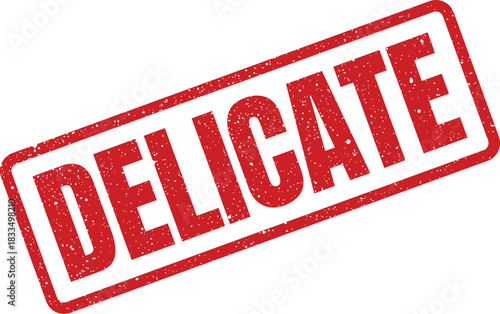 Grungy red rubber stamp with DELICATE warning message for careful handling and packaging instructions