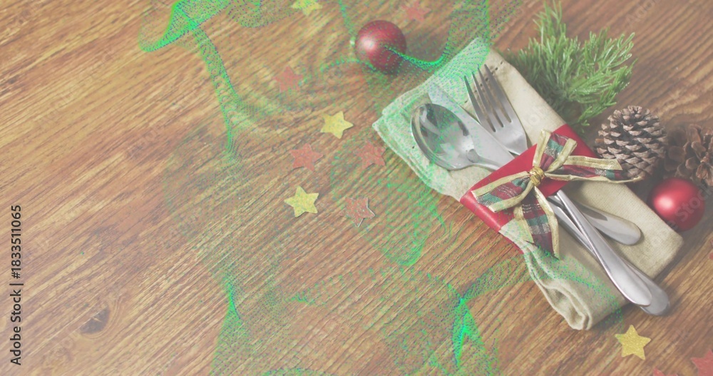 Fototapeta premium Displaying steel cutlery wrapped in beige napkin with ribbon and pinecone on wood table, copy space