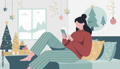 Woman using phone in bed enjoying cozy Christmas morning indoors surrounded by festive decor