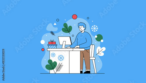 Worker doing office tasks on computer during the winter holiday season with gifts