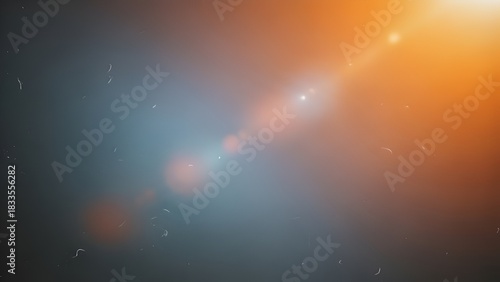 Abstract light flares and dust particles creating a textured background image