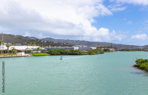 Landscape view Kuapa Pond. Kuapa Pond was a type of shore fish pond in which a wall, kuapa, was built to enclose a loko (pond) in which fish were stocked. As viewed February 27, 2024