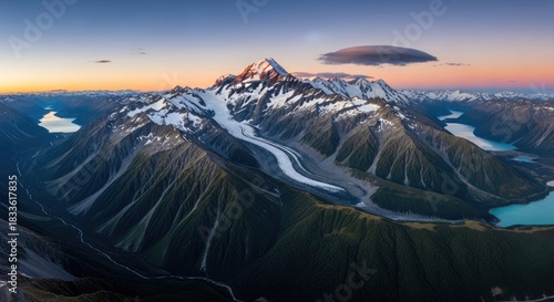 Mount Cook, New Zealand, at sunset with snow-capped peaks and glacial lakes.
