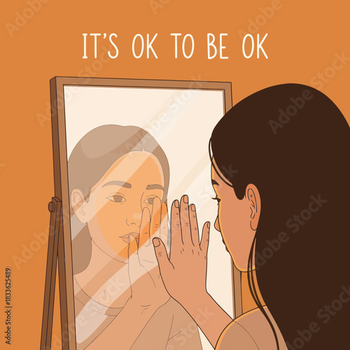 Woman looks in mirror and touches her reflection with her hand.