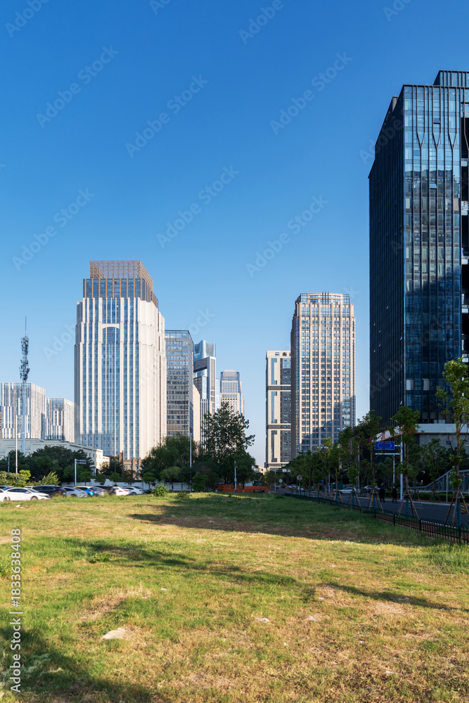 Obraz premium city park with modern building background in shanghai