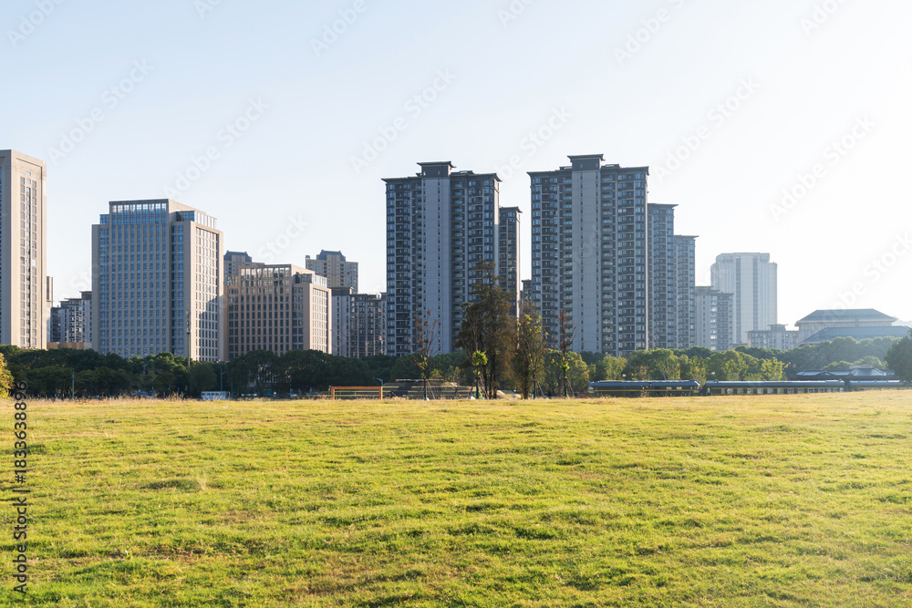 Obraz premium spring park and modern city