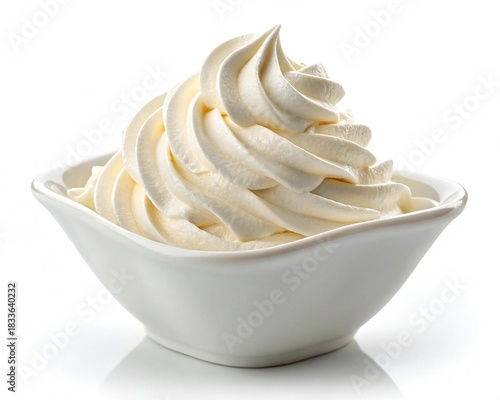 Whipped cream swirl in a white bowl