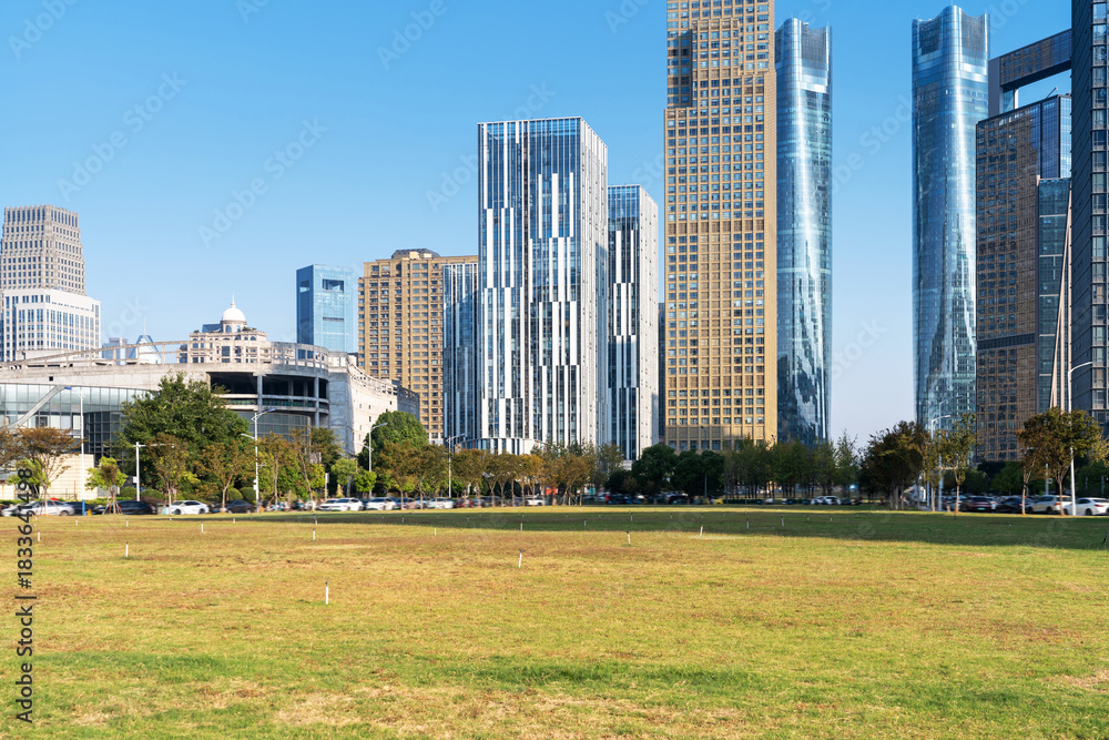 Obraz premium city park with modern building background in shanghai