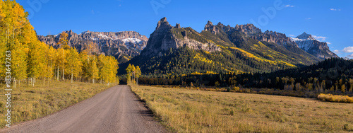 Autumn in The San Juan Mountains - Autumn evening view of Owl Creek Pass Road extending south into the rugged San Juan Mountains region. Colorado, USA.