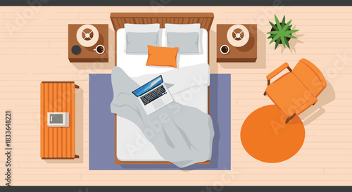 Top-down view of a cozy and modern bedroom with a laptop on the bed, showing a comfortable space for work or relaxation.