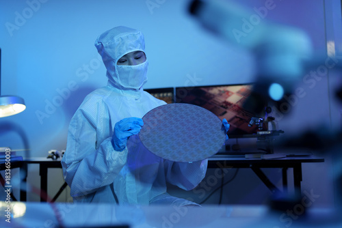 Technician working on analyzing semiconductor or microchip boards, electronics industry, electronic engineer, computer technology, CPU maintenance, hardware, motherboard component upgrades.	