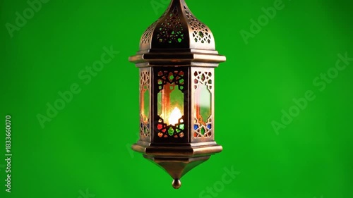 Beautifully Ornate Ramadan Lantern With Flickering Flame on a Green Screen Background for Festive Decoration