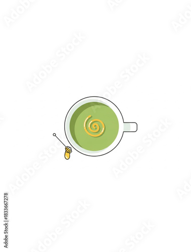 Top view of matcha latte with honey swirl and honey dipper